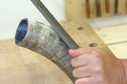 Rasping bones with a file