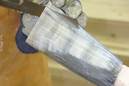 Cutting bones with a saw